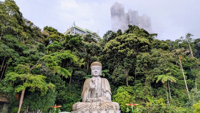 Chin Swee Temple Giant Buddha Statue with Genting Highlands Buildings &ndash; Iconic Religious Landmark Malaysia