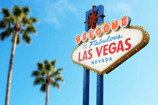 Welcome to Fabulous Las Vegas Sign With Plane Arriving. Logo Removed. The beautiful clear sky in the background.