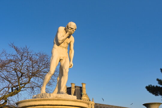 statue of Cain after killing his brother Abel in Paris