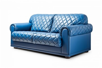 Fototapeta premium Blue quilted leather sofa offering modern comfort on a white background