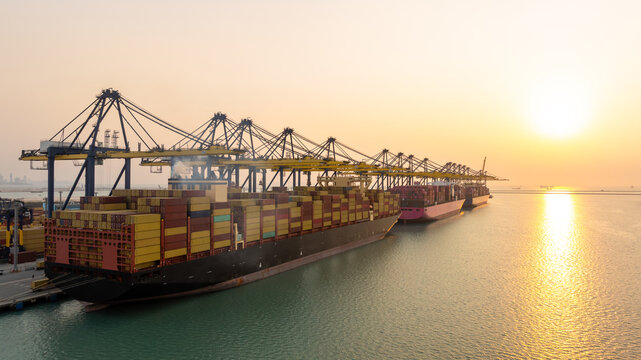 Aerial view Container cargo ship loading unloading container import export sea port, Global trade business container cargo ship freight shipping commercial trade logistic transportation international.