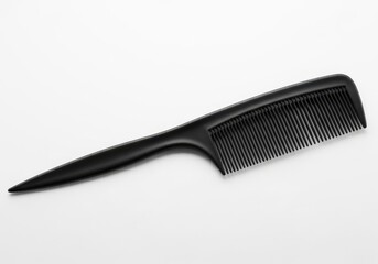 Black plastic comb with wide teeth isolated on white background