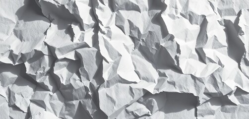 Deep creases and shadows on crumpled white paper, showing texture and light reflection,  macro,  paper texture
