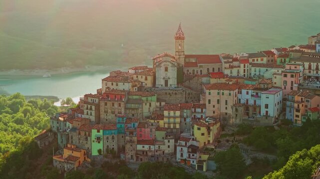 Aerial view of Colledimezzo at sunset overlooking Lake Bomba