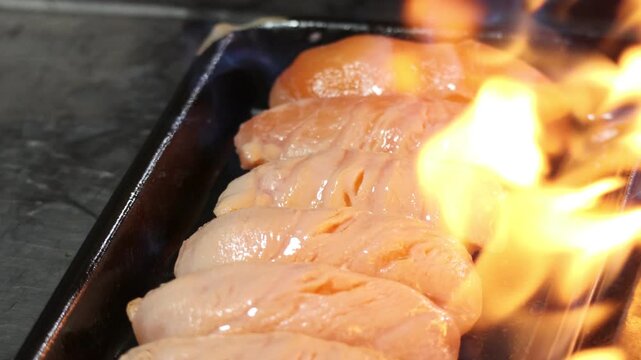 Aburi Salmon Nigiri Sushi (Seared Salmon Sushi)
Pieces Being Seared with a Kitchen Torch Flame on a Long Black Serving Plate.