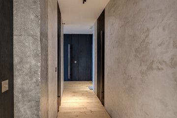 long empty corridor in interior of entrance hall of modern apartments, office or clinic