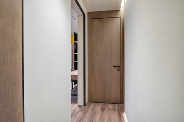 long empty corridor in interior of entrance hall of modern apartments, office or clinic