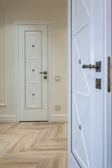 long empty corridor in interior of entrance hall of modern apartments, office or clinic