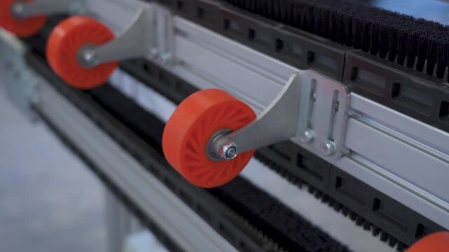 Conveyor belt rollers moving on production line
