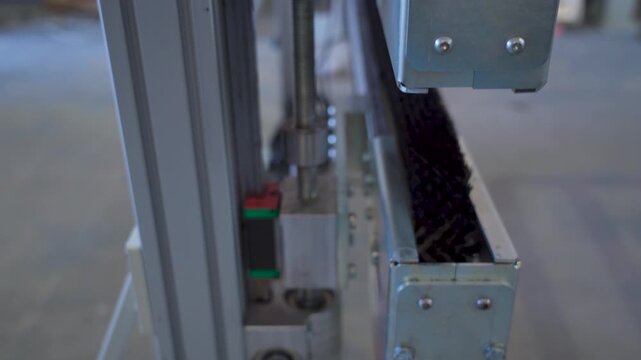 Automated brush system cleaning mechanism in motion