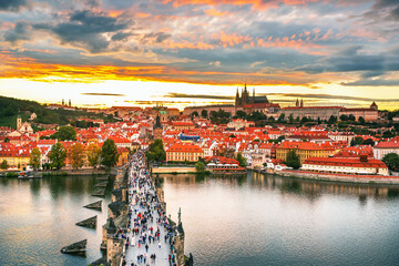 Charles Bridge (Karlův most) in Prague, Czech Republic, spanning the Vltava River with historic towers and Gothic architecture. Panoramic view of the medieval bridge and city skyline, iconic European  © Rastislav Sedlak SK
