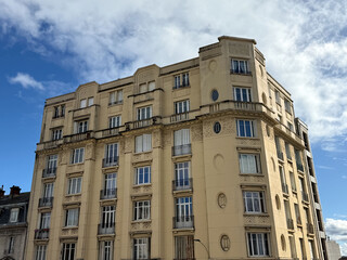 Fototapeta premium Art Deco residential building facade with balconies