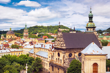 Fototapeta premium Charles Bridge (Karlův most) in Prague, Czech Republic, spanning the Vltava River with historic towers and Gothic architecture. Panoramic view of the medieval bridge and city skyline, iconic European 