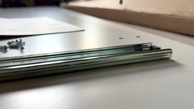 Drilling Screws while driving into wooden material. Construction industry. Cordless combi drill for used as drill and screw driver. Screwdriver for work with self-tapping screws in furniture workshop.