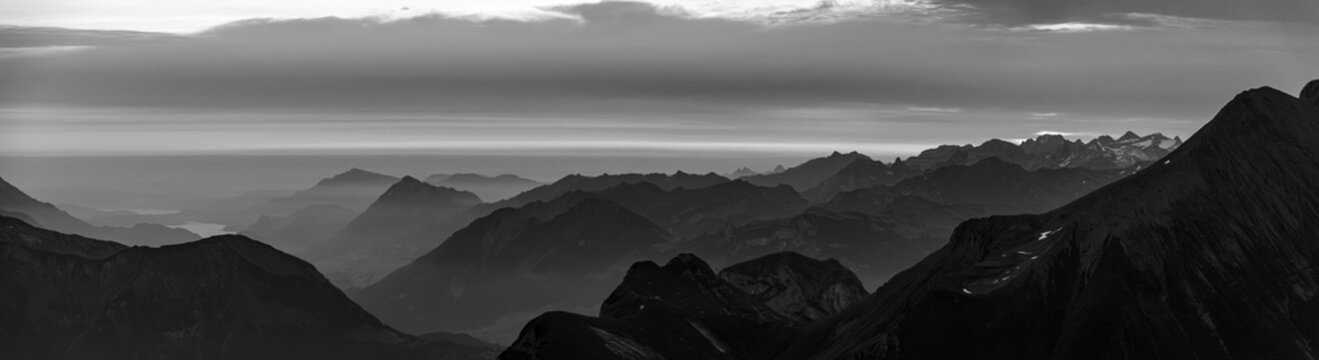 Sunrise over the Bernese alps with mountains Wildgaerst and Schwarzhorn in the foreground