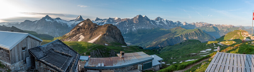 The most iconic mountain chain of the Swiss alps with mount Eiger, Jungfrau, Schreckhorn and Moench, mount Reeti in the foreground