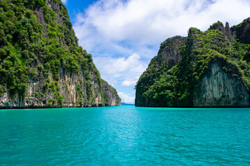 Phi Phi Islands Near Phuket Thailand. Beautiful landscape Limestone rock formations on Andaman Sea, Turquoise clear blue and green water