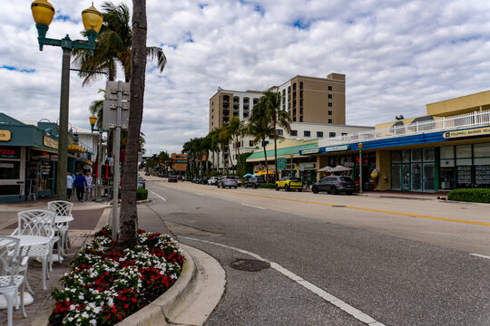 Vibrant Street Scene on Atlantic Avenue in Downtown Delray Beach, Florida with Palm Trees and Historic Architecture