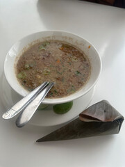 Coto Makassar Dish with Lontong