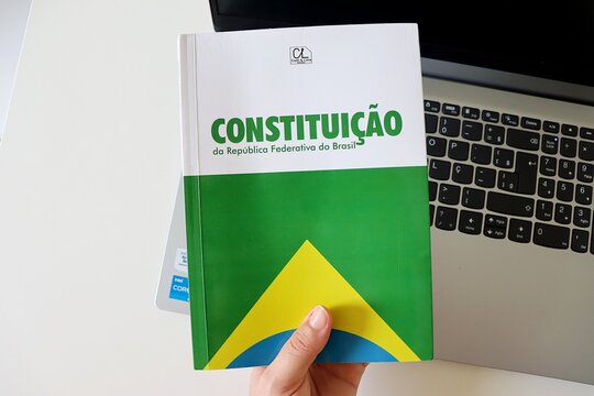Salvador, Brazil - February 15, 2026: Book of the Constitui&ccedil;&atilde;o da Rep&uacute;blica Federativa do Brasil (Constitution of the Federative Republic of Brazil). Concept of Brazilian law, democracy and justice.