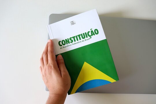 Salvador, Brazil - February 15, 2026: Book of the Constitui&ccedil;&atilde;o da Rep&uacute;blica Federativa do Brasil (Constitution of the Federative Republic of Brazil). Concept of Brazilian law, democracy and justice.