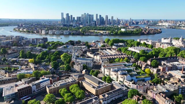 Aerial drone cinematic video over iconic city of Greenwich built in Peninsula, London, United Kingdom