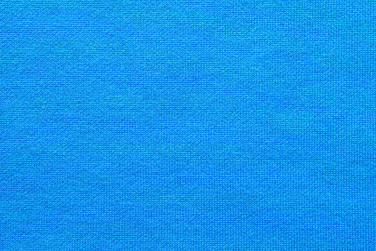 Fine blue cotton jersey fabric texture as background