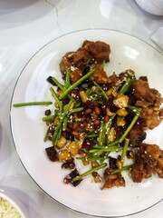 Stir Fried Sichuan Chicken on a Plate