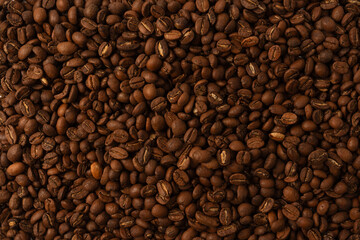 Fototapeta premium Coffee beans on a white background. Coffee beans texture.