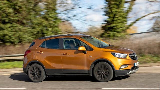 Milton Keynes,Bucks,UK - Feb 14th 2026:  2019 orange Vauxhall Mokka SUV car driving on a British road