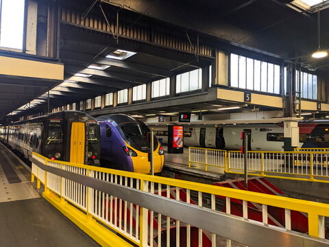 Modern Avanti West Coast Pendolino train at a platform inside London Euston Railway Station