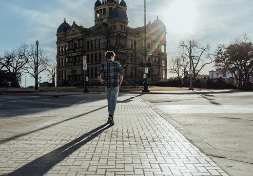 Young Man Crossing the Street