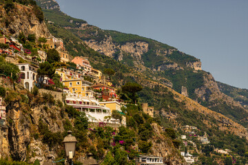 Obraz premium Iconic village of Positano Italy with main cathedral and colorful old buildings on the cliffs of the Amalfi Coast