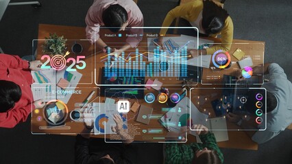 Fototapeta premium A diverse business team engages in a collaborative meeting, analyzing data and trends for e-commerce growth in 2025, utilizing modern technology and tools. Raster