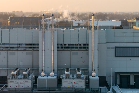 Aerial view of a modern data center infrastructure featuring cooling and ventilation systems cloud computing and it operations, Warszawa, Wojewodztwo mazowieckie, Poland.