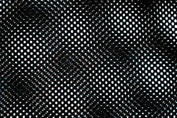 Background texture of black mesh fabric in close-up view. Detailed macro shot revealing intricate weave pattern and dimensional surface of the material.