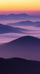 Fototapeta premium Distant mountain range layered with ethereal fog under soft, blended gradient sky, representing serene vastness, mystery, and natural beauty