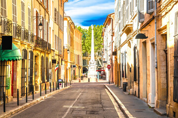 Obraz premium Aix en Provance, France. Colorful alley and obelisk in Aix en Provance view