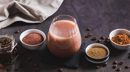 Fototapete Rund Cafe Spicy coffee with chocolate, salt and pepper in a glass on the table web banner  © elenarui