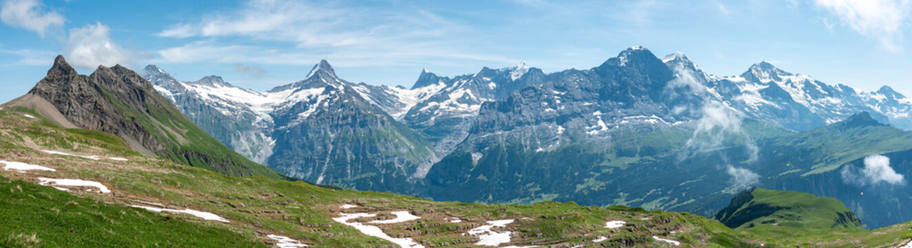 Panoramic view on the iconic Swiss mountains Wetterhorn, Schreckhorn, Eiger, Moench and Jungfrau in the Bernese Highland