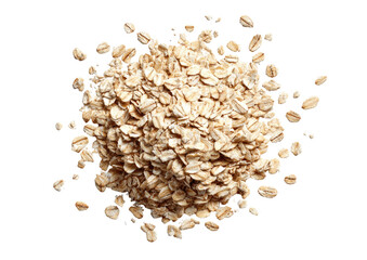 A top-down view of rolled oats scattered in a pile on a dark background, some loose