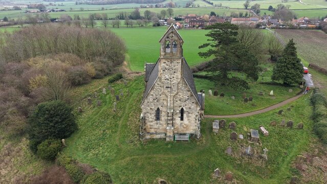 aerial view of All Saints Church. Burythorpe, north yorkshire 