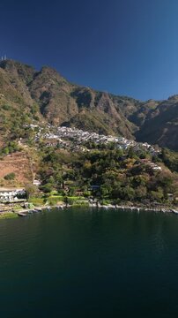 Vertical aerial Santa Cruz La Laguna hillside town Lake Atitl&aacute;n Guatemala