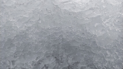 Obraz premium Snow small textured pieces on the ground for sea food storage