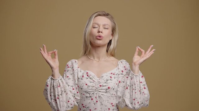 Tranquil Woman Relaxing, Meditating, Refuses Stress. Young Lady Breathes Deeply 