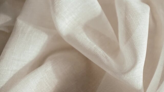 High-quality white loose texture cotton or linen fabric with a natural woven pattern. Ideal for themes of sustainable fashion, luxury bedding, home decor, and organic lifestyle.