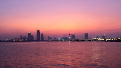Obraz premium the newly developed lusail city with for al sadd tower in the background