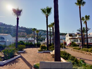 Obraz premium urbanisation with palms and beach access in Manilva, Playa del Gobernador, Costa del Sol, Andalusia, Malaga, Spain