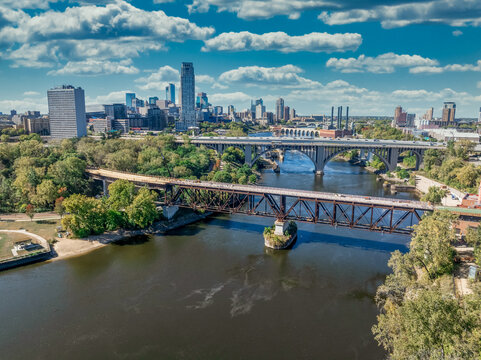 I-35W Saint Anthony Falls Bridge and 10th Ave bridge over the Mississippi river with Minneapolis downtown