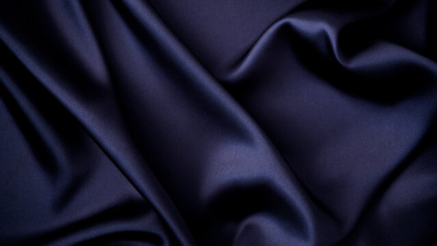 Elegant navy blue silk fabric texture background